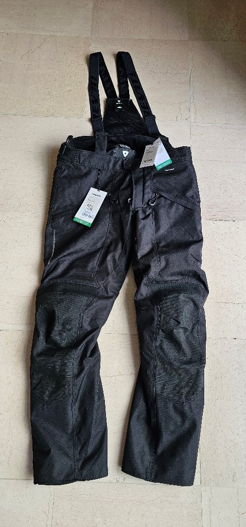 Regenbroek motor inclusief bretels Rev'it!, Heren, Broek | textiel, Rev'it, Ophalen