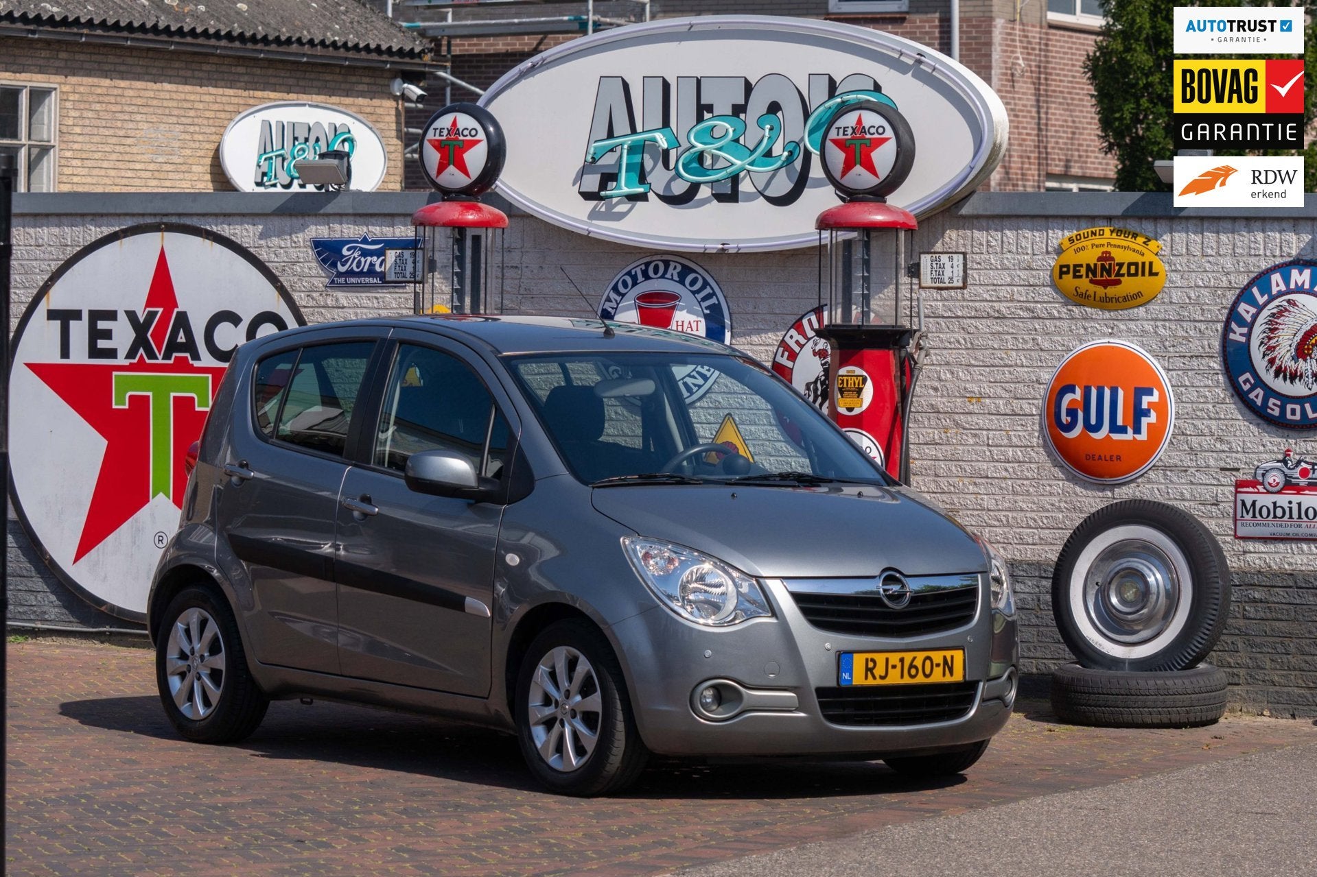 Opel Agila 1.2 Edition Automaat 1e Eigenaar 61.800 km +NAP, Auto's, Stof, 4 cilinders, Bedrijf, Grijs