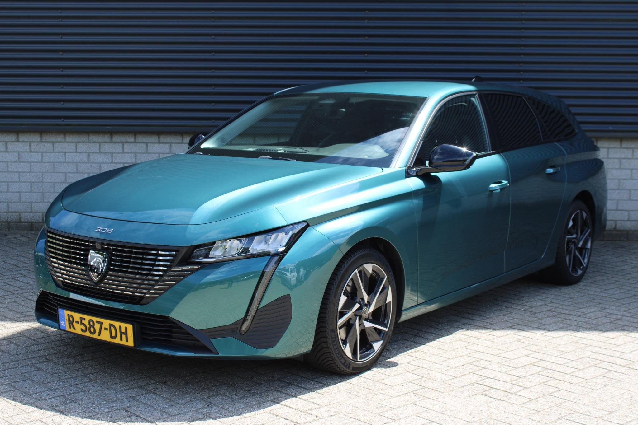 Peugeot 308 SW 1.2 PureTech Allure Pack Business, Auto's, Voorwielaandrijving, 1199 cc, Blauw, Leder en Stof