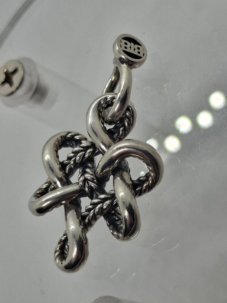 Buddha to Buddha Endless Knot hanger, Ophalen of Verzenden, Zo goed als nieuw, Kruis of Symbool, Zilver