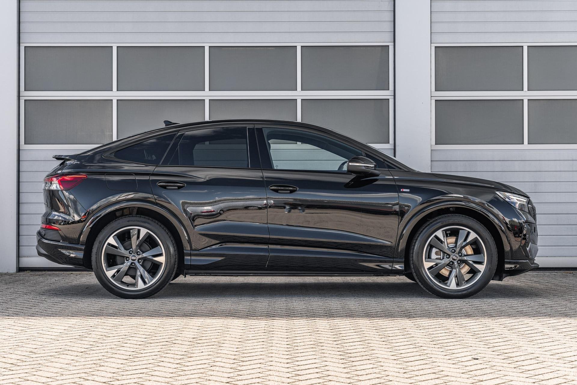 Audi Q4 Sportback e-tron 45 quattro 286pk S edition Competit, Auto's, Automaat, Gebruikt, Zwart, 82 kWh