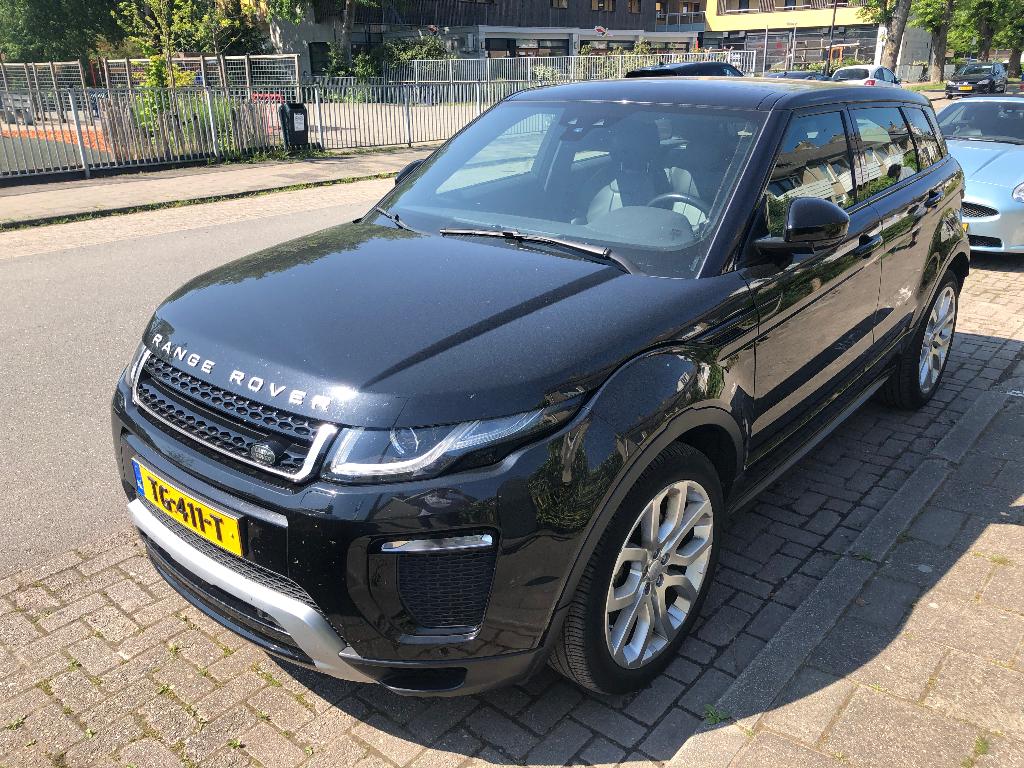 Land Rover Range Rover Evoque 2.0 Si4 240pk 4WD Aut 2018, Auto's, 1800 kg, Zwart, 4 cilinders, Zwart