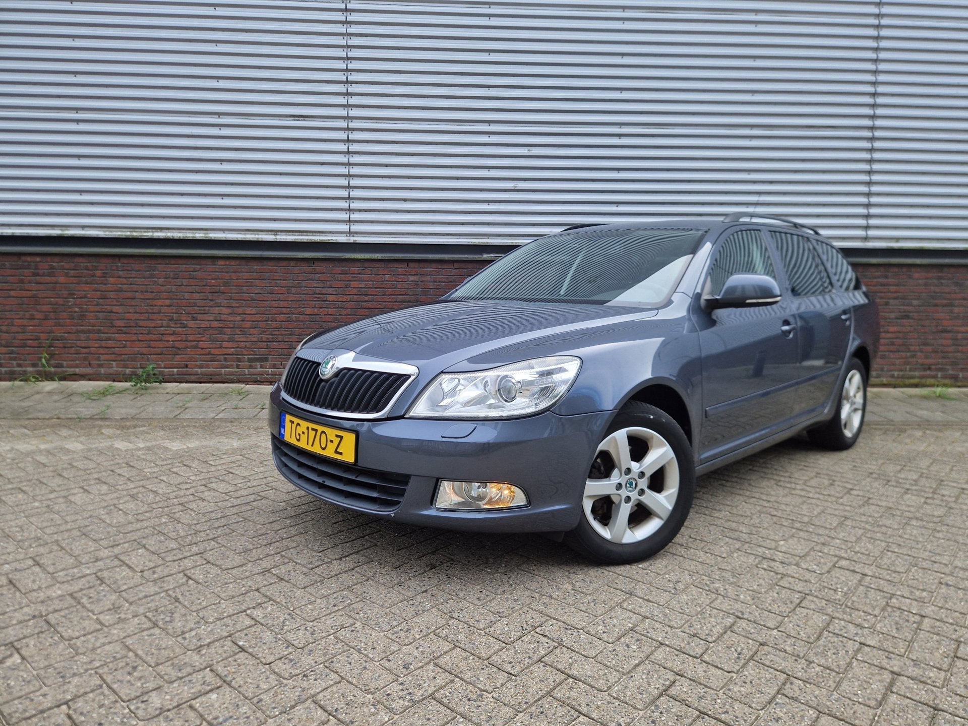 Skoda Octavia Combi 1.8 TSI Xenon - Clima - Cruise control -, Auto's, Voorwielaandrijving, Euro 5, Stof, Zwart