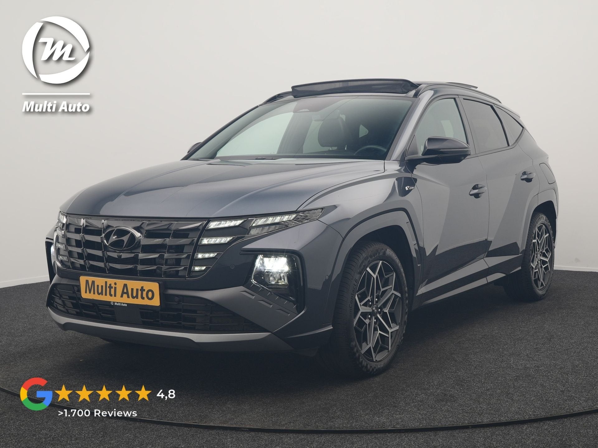 Hyundai Tucson 1.6 T-GDI PHEV N Line Sky 4WD 265pk Dealer O., Auto's, Automaat, Gebruikt, Zwart, 4 cilinders