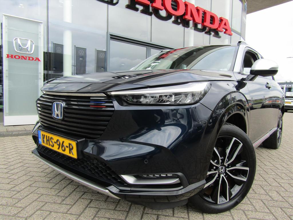 Honda HR-V 1.5 i-MMD 131pk CVT Advance Style, Auto's, Honda, Blauw, Leder en Stof, Bedrijf, 19 km/l