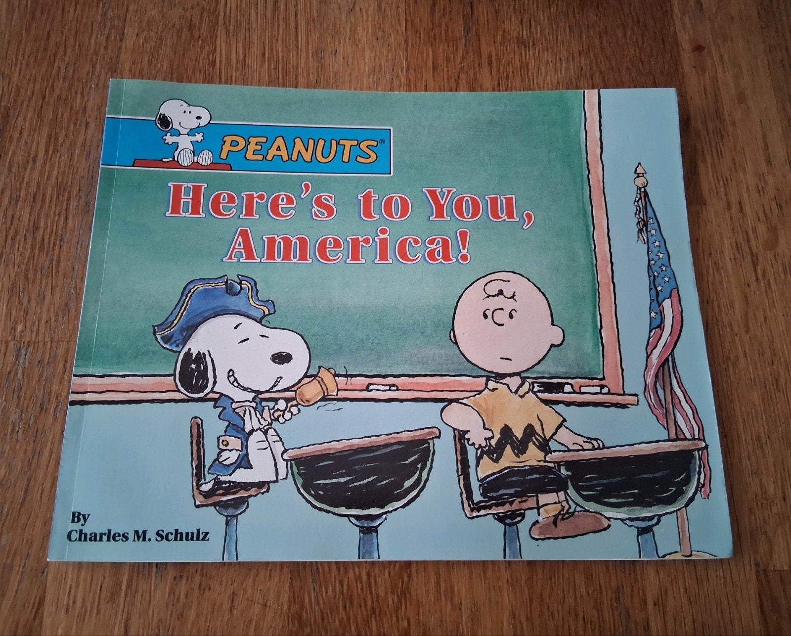 Peanuts: Here's to You, America!, Eén stripboek, Ophalen of Verzenden, Gelezen, Charles M. Schulz