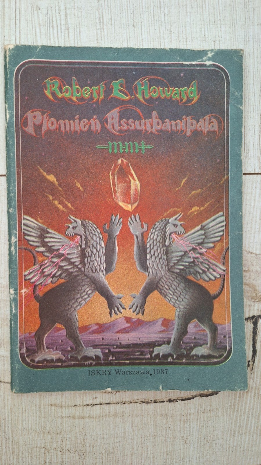 Robert E. Howard - Płomień Assurbanipala (Pools), Ophalen of Verzenden, Zo goed als nieuw, Robert E. Howard