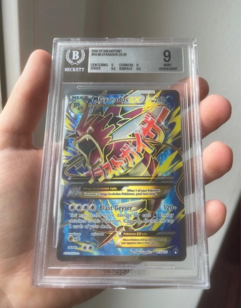 M Gyarados EX 115/122 Breakpoint Beckett 9, Ophalen of Verzenden, Zo goed als nieuw