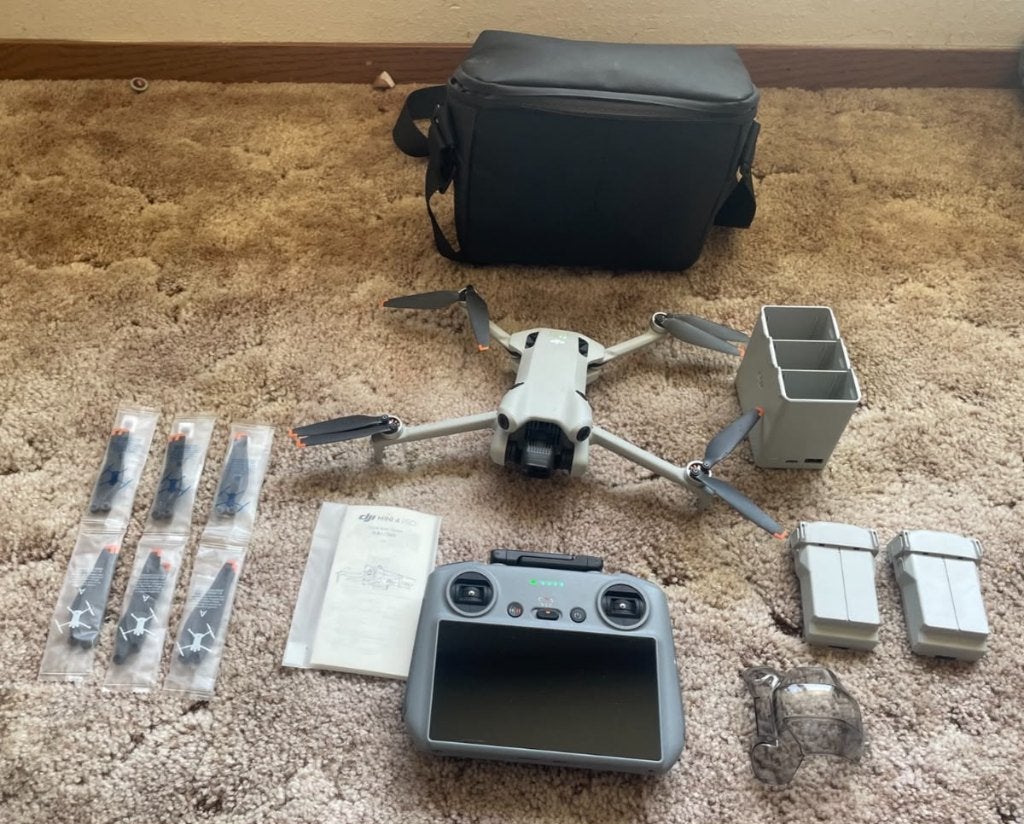 DJI Mini 4 Pro Fly More Combo RC 2 Controller, Audio, Tv en Foto, Drones, Ophalen, Return to Home, Zo goed als nieuw, Professionele drone