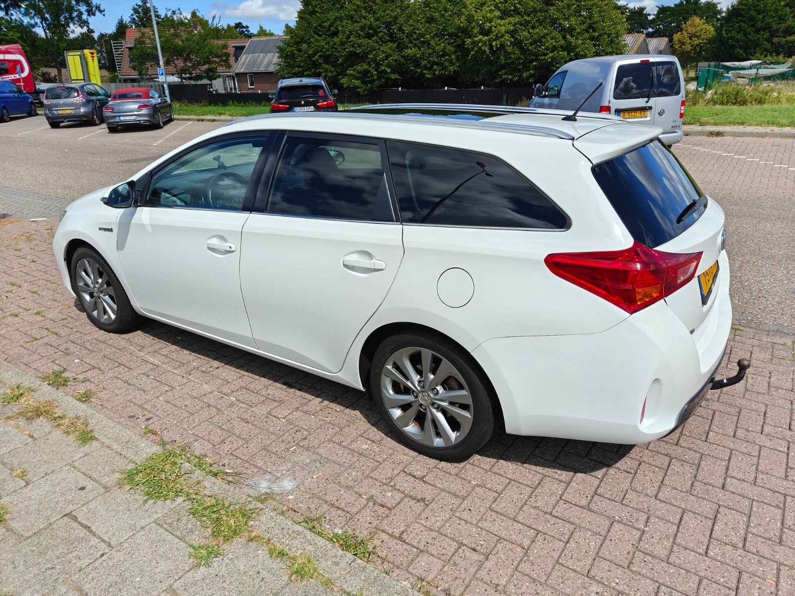 Toyota Auris 1.8 Hybrid Touring Sports CVT 2013 Wit, Auto's, Toyota, Stof, 345 kg, Wit, Origineel Nederlands