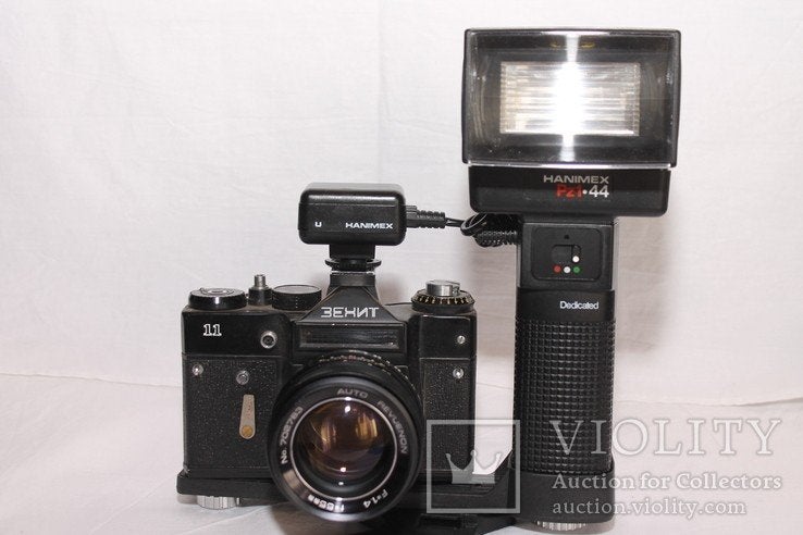 model Hanimex PZ144 Camera flitser met houder, Ophalen of Verzenden, Nieuw, Overige merken, Kantelbaar