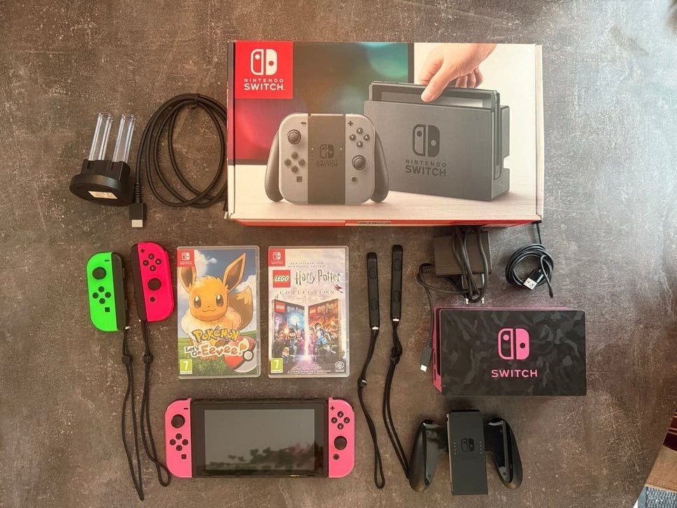 Nintendo Switch met 2 extra controllers en 2 games, Ophalen, Met games, Zo goed als nieuw, Switch Original