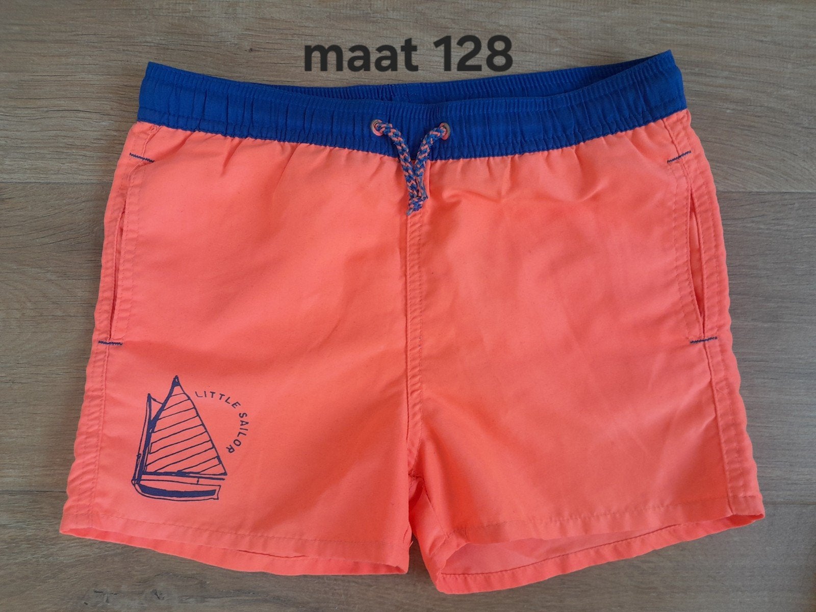 Zwemshort maat 128 - Oranje met blauwe band, Kinderen en Baby's, Gebruikt, Sport- of Zwemkleding, Ophalen of Verzenden, Onbekend