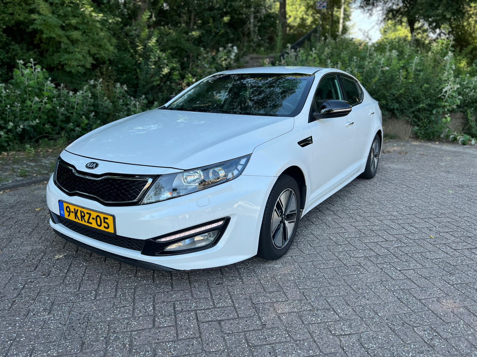 Kia Optima 2.0 CVVT Hybrid / Navigatie | Climate, Auto's, Kia, Parkeersensor, 4 cilinders, Optima, Wit
