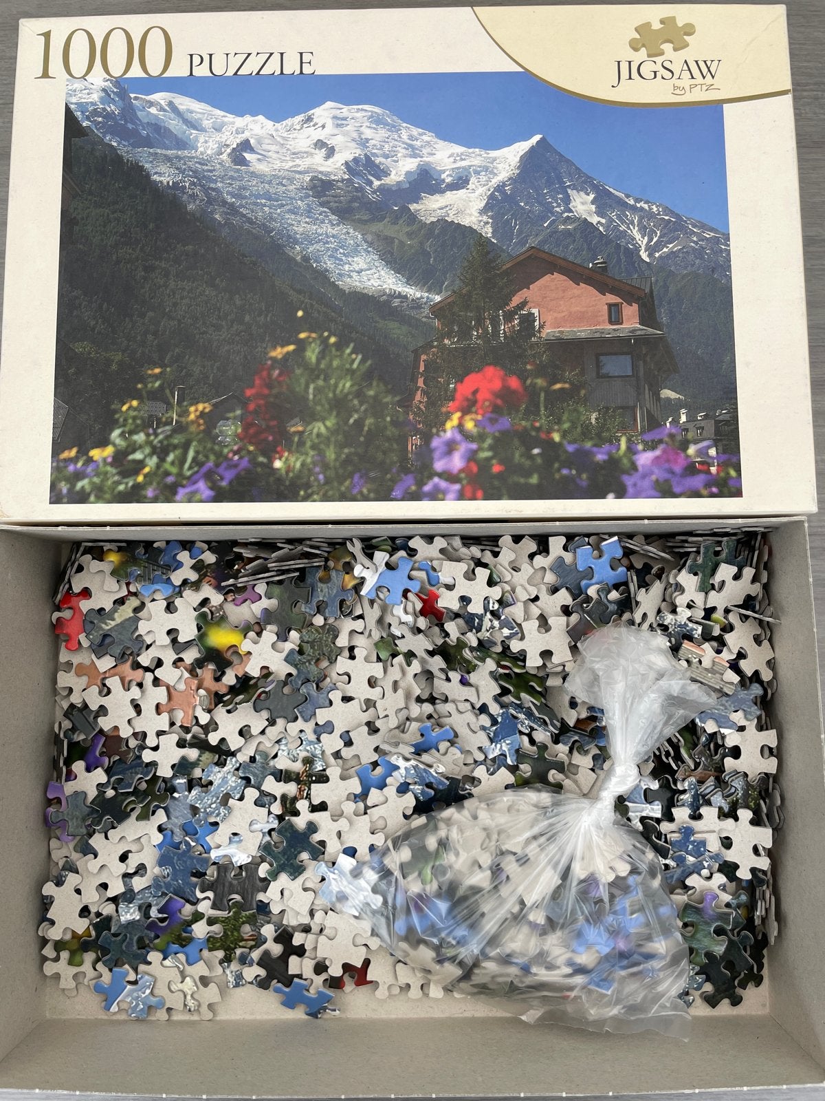 Jigsaw Puzzel 1000 stukjes - Bergen en huisje, Ophalen of Verzenden, 500 t/m 1500 stukjes, Gebruikt, Legpuzzel