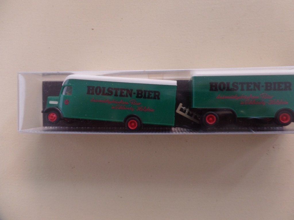 Oldtimer vrachtwagen / aanhanger Holsten bier Herpa, Hobby en Vrije tijd, Verzenden, Nieuw, Bus of Vrachtwagen, Herpa