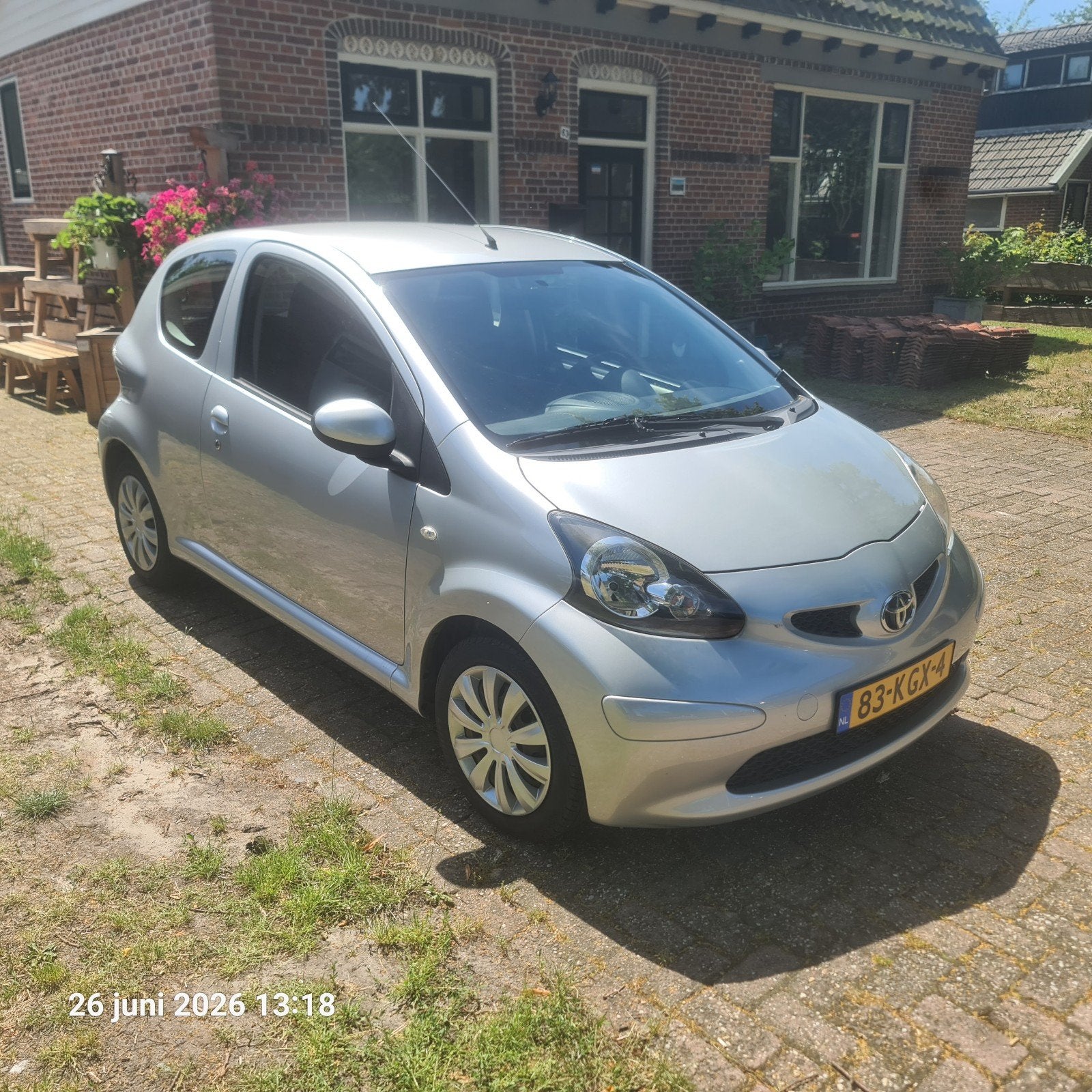 Toyota Aygo 1.0 12V Vvt-i 3DRS MMT 2009 Grijs, Auto's, Stof, Euro 6, 68 pk, Origineel Nederlands
