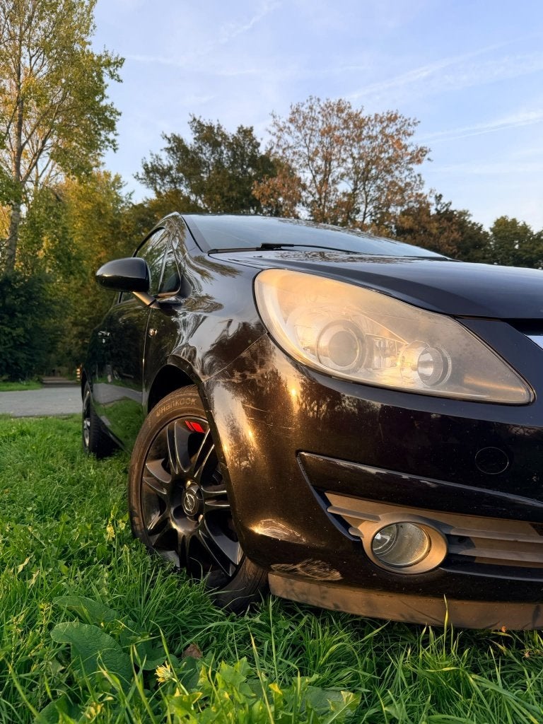 Opel Corsa 1.4 16V 3D 2010 Zwart, Auto's, Voorwielaandrijving, 1398 cc, 4 cilinders, 100 pk