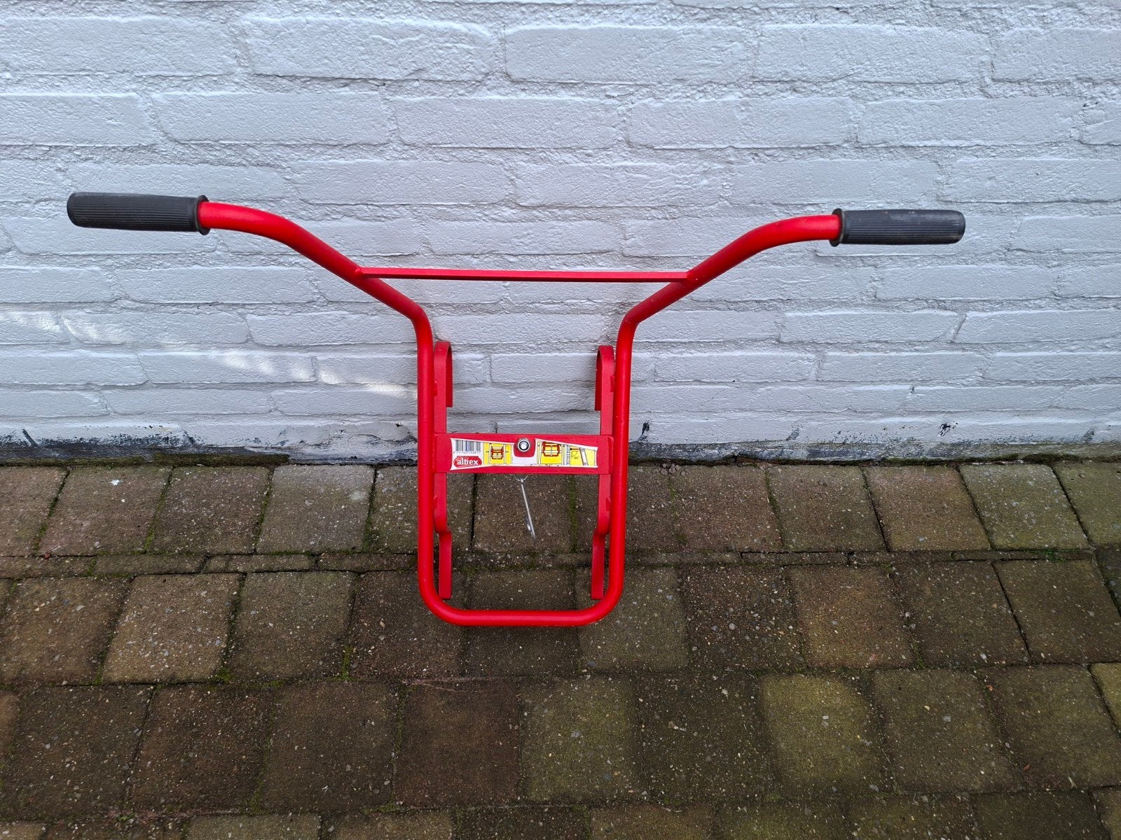 Altrex trapafstandhouder, Ophalen