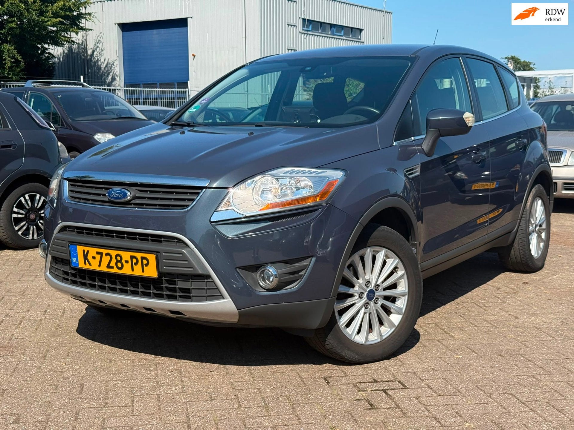 Ford Kuga 2.5 20V Titanium, Auto's, Euro 5, Gebruikt, Leder en Stof, 2521 cc