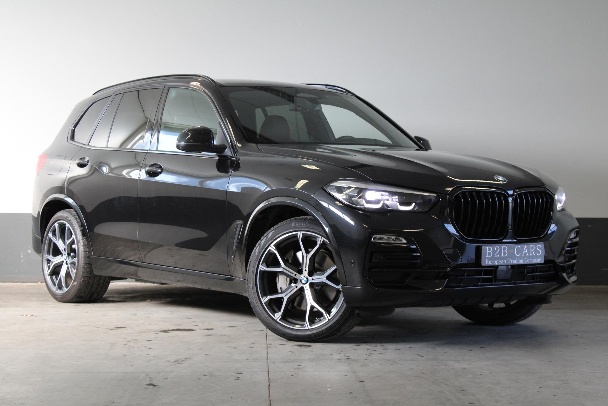BMW X5 xDrive45e Sport | Luchtvering | Shadow-line | Lederen, Auto's, Gebruikt, 394 pk, Zwart, Vierwielaandrijving