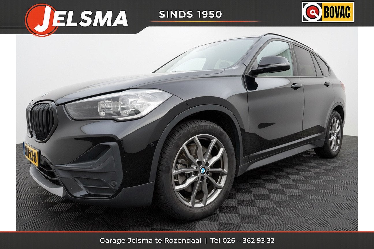 BMW X1 xDrive25e aut. PHEV | Navi | Clima (bj 2021), Auto's, BMW, Stof, Gebruikt, Zwart, Bedrijf