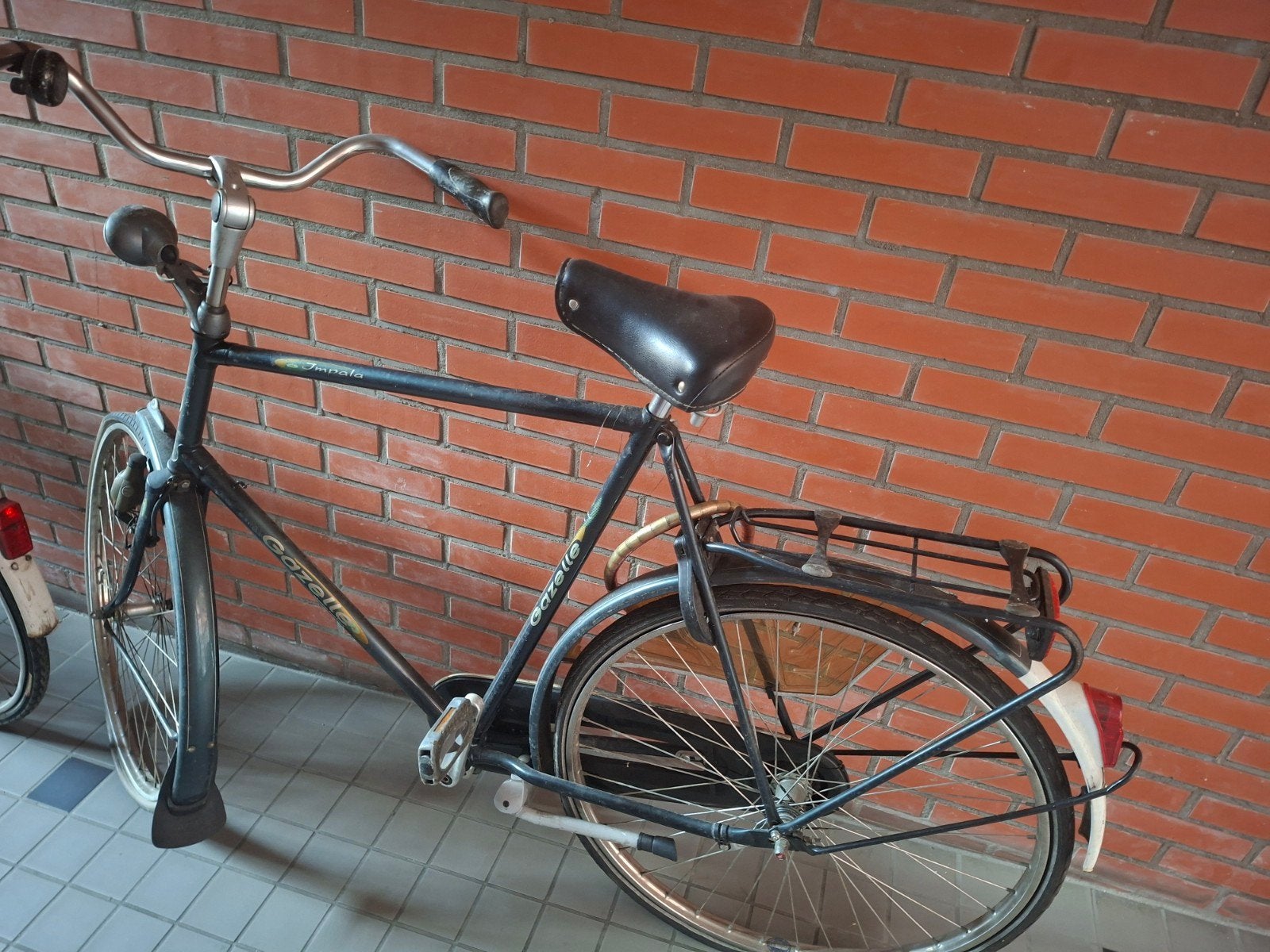 Gezelle herenfiets, Ophalen