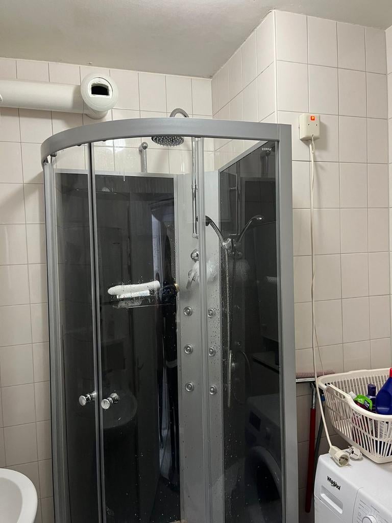 Douchecabine met functies, Ophalen