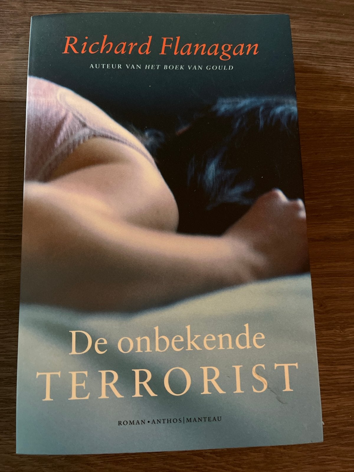 De onbekende terrorist - Richard Flanagan (Roman), Ophalen of Verzenden, Zo goed als nieuw, Wereld overig