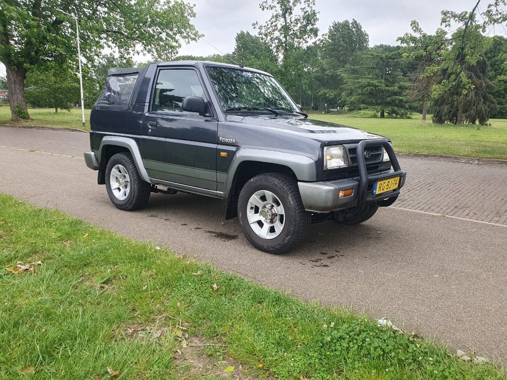 Daihatsu Feroza 1.6 I Resin+ softtop 4WD 1997 blauw-grijs, Feroza, Stof, Origineel Nederlands, Handgeschakeld