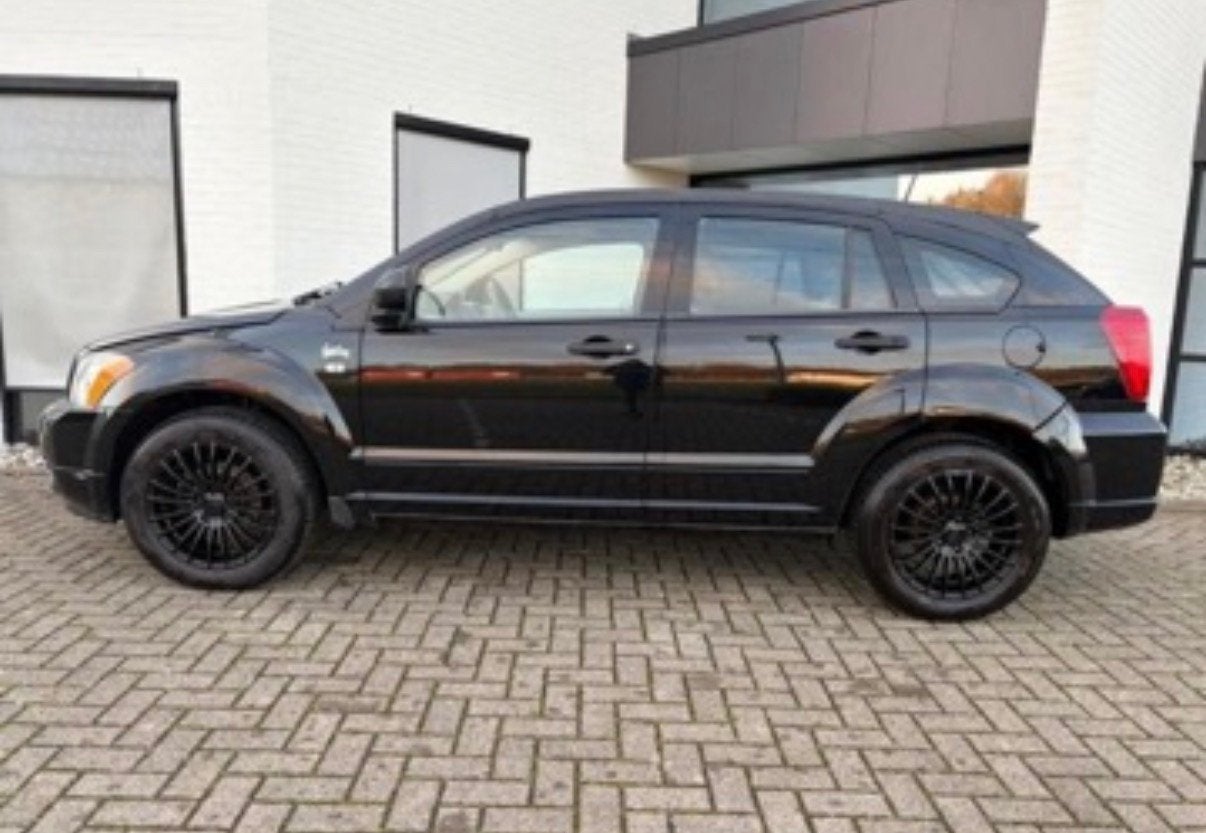 Dodge Caliber 1.8 benzine 2007 Zwart APK, Auto's, Voorwielaandrijving, 450 kg, 1295 kg, Zwart