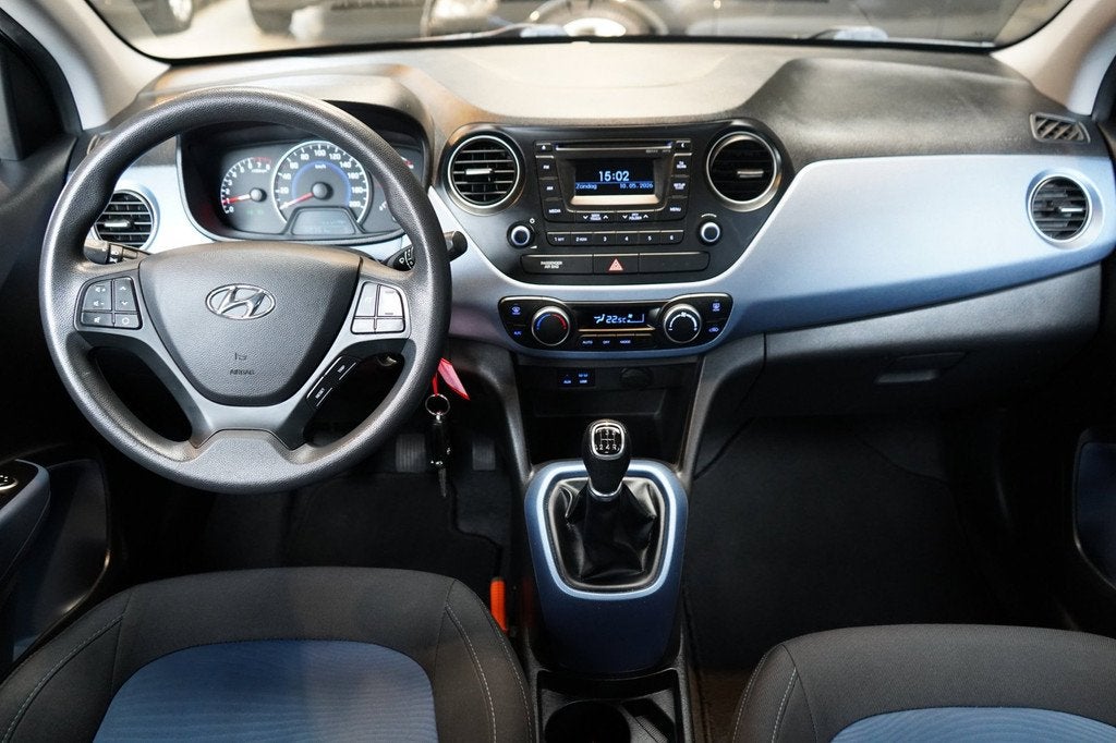 Hyundai I10 1.0i i-Motion Comfort | AIRCO | CRUISE | ELEK.RA, Auto's, Voorwielaandrijving, Euro 5, Stof, Gebruikt