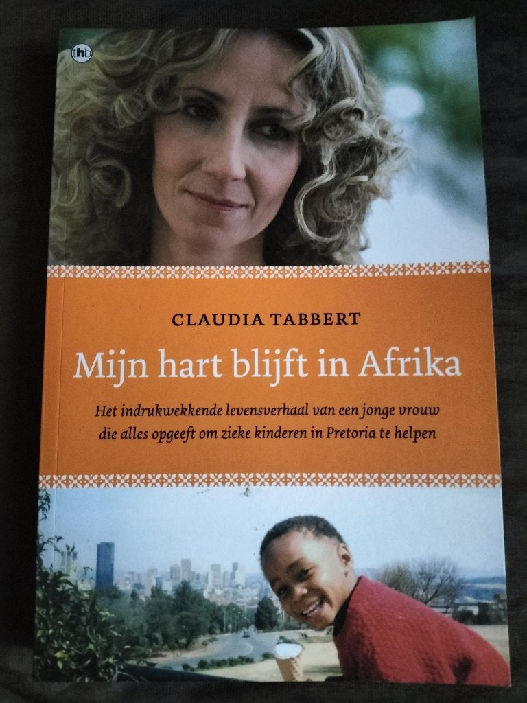 Claudia Tabbert - Mijn hart blijft in Afrika, Boeken, Biografieën, Zo goed als nieuw, Ophalen of Verzenden
