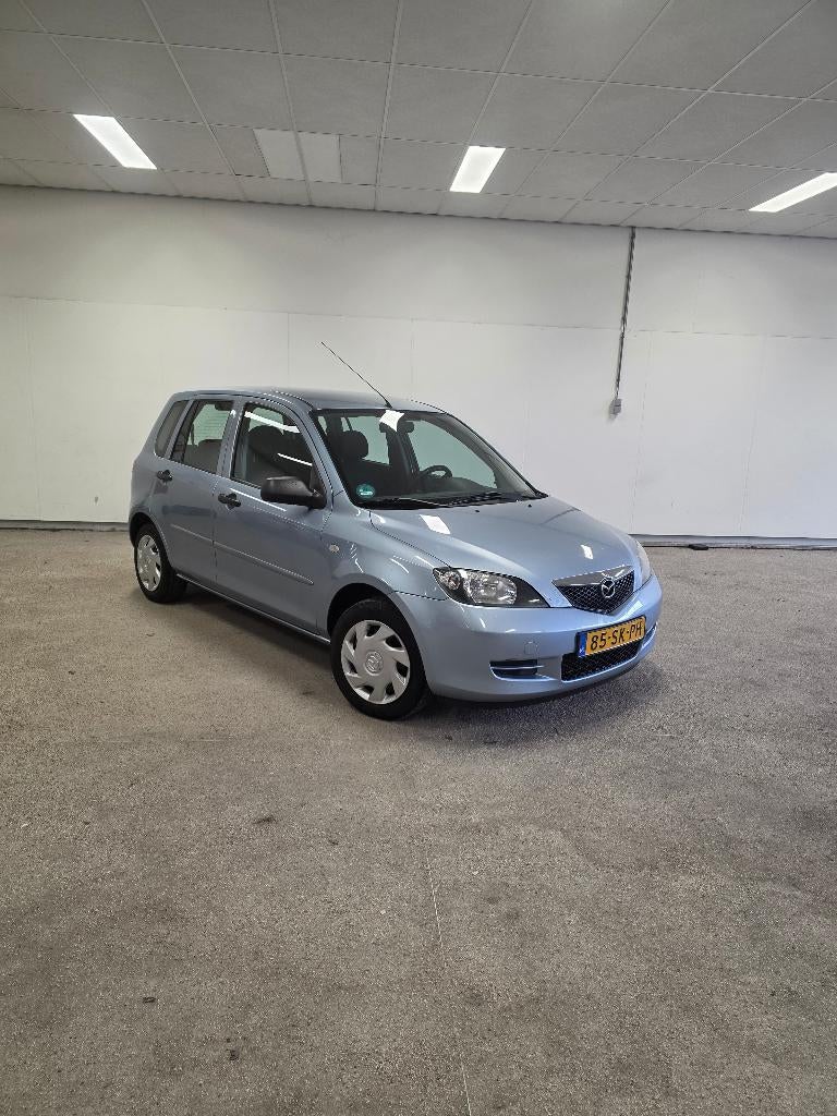 Mazda 2 1.4 16V 2006 Blauw, Auto's, Voorwielaandrijving, 40 €/maand, Zwart, 4 cilinders