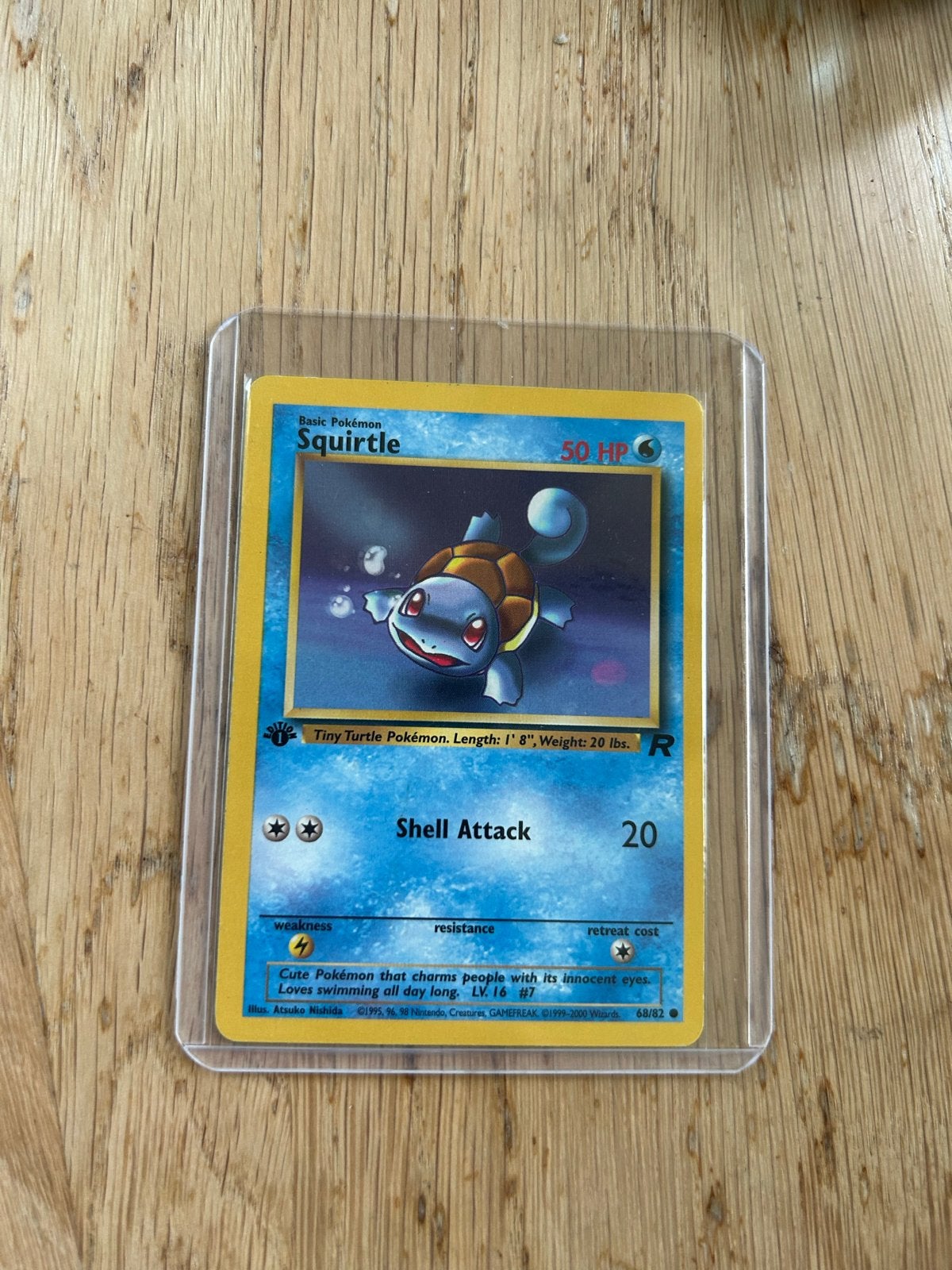 First edition Squirtle 63/82 - Base Set 2, Ophalen of Verzenden, Zo goed als nieuw, Losse kaart