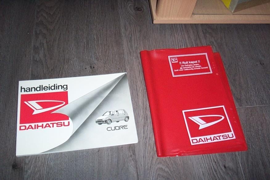 Gebruikershandleiding+mapje DAIHATSU CUORE  850   1988/1992, Auto diversen, Handleidingen en Instructieboekjes, Ophalen of Verzenden