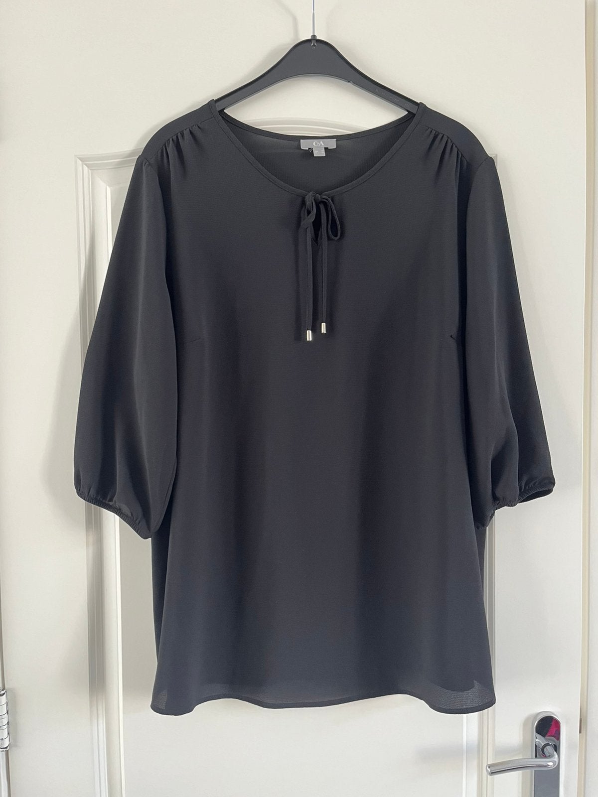 Zwarte top maat 52, Kleding | Dames, Ophalen of Verzenden, Zo goed als nieuw, Zwart, Shirt of Top