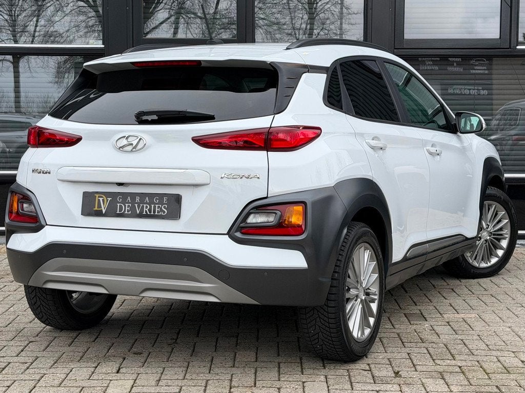 Hyundai Kona 1.0T Premium Full Option HUD Leder Camera Keyle, Auto's, Hyundai, Voorwielaandrijving, Gebruikt, Zwart, Wit