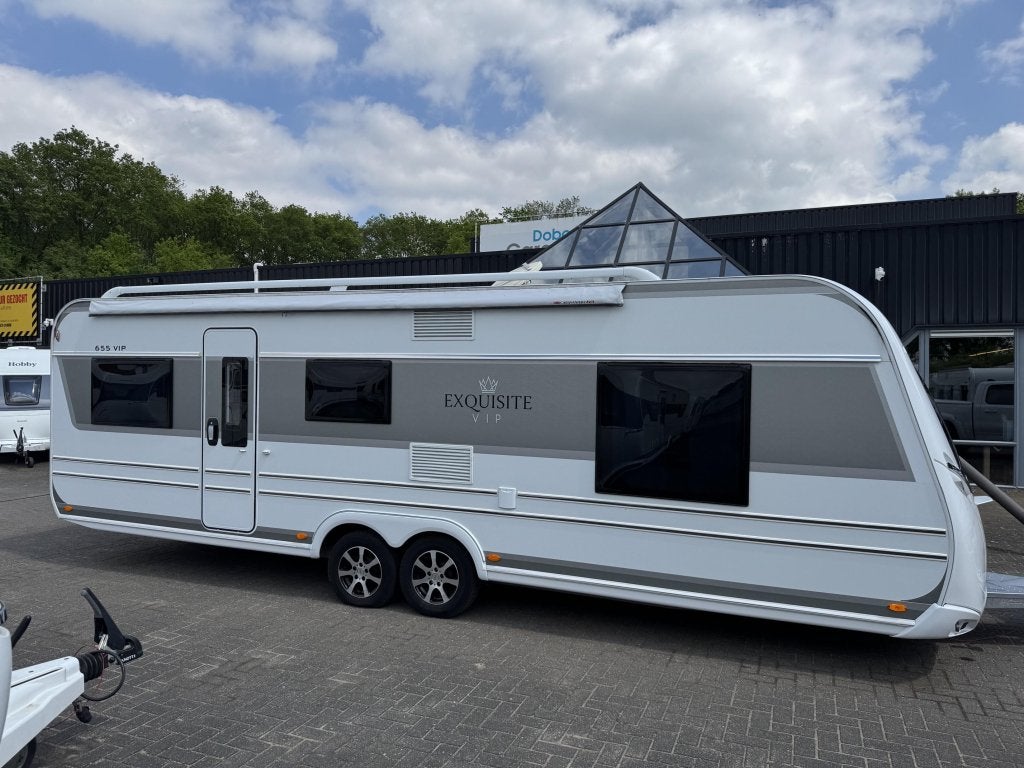 LMC Exquisit 655 VIP 2022 | Nieuwe voortent, Caravans en Kamperen, Caravans, Schokbreker, Bedrijf, Treinzit, 6 tot 7 meter