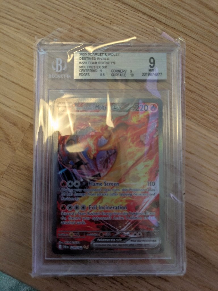 Team Rocket's Moltres ex (DRI 229) Beckett 9, Ophalen of Verzenden, Zo goed als nieuw, Losse kaart