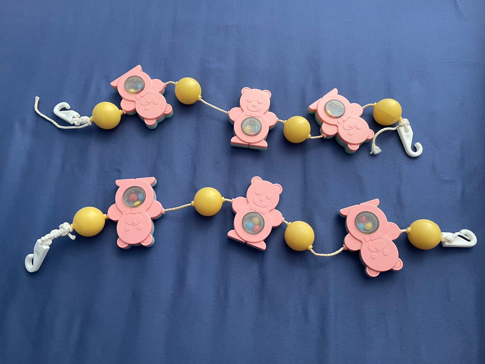 2 x Vintage Kinderwagen Spanners.Roze /Blauw., Ophalen of Verzenden, Gebruikt, Rammelaar