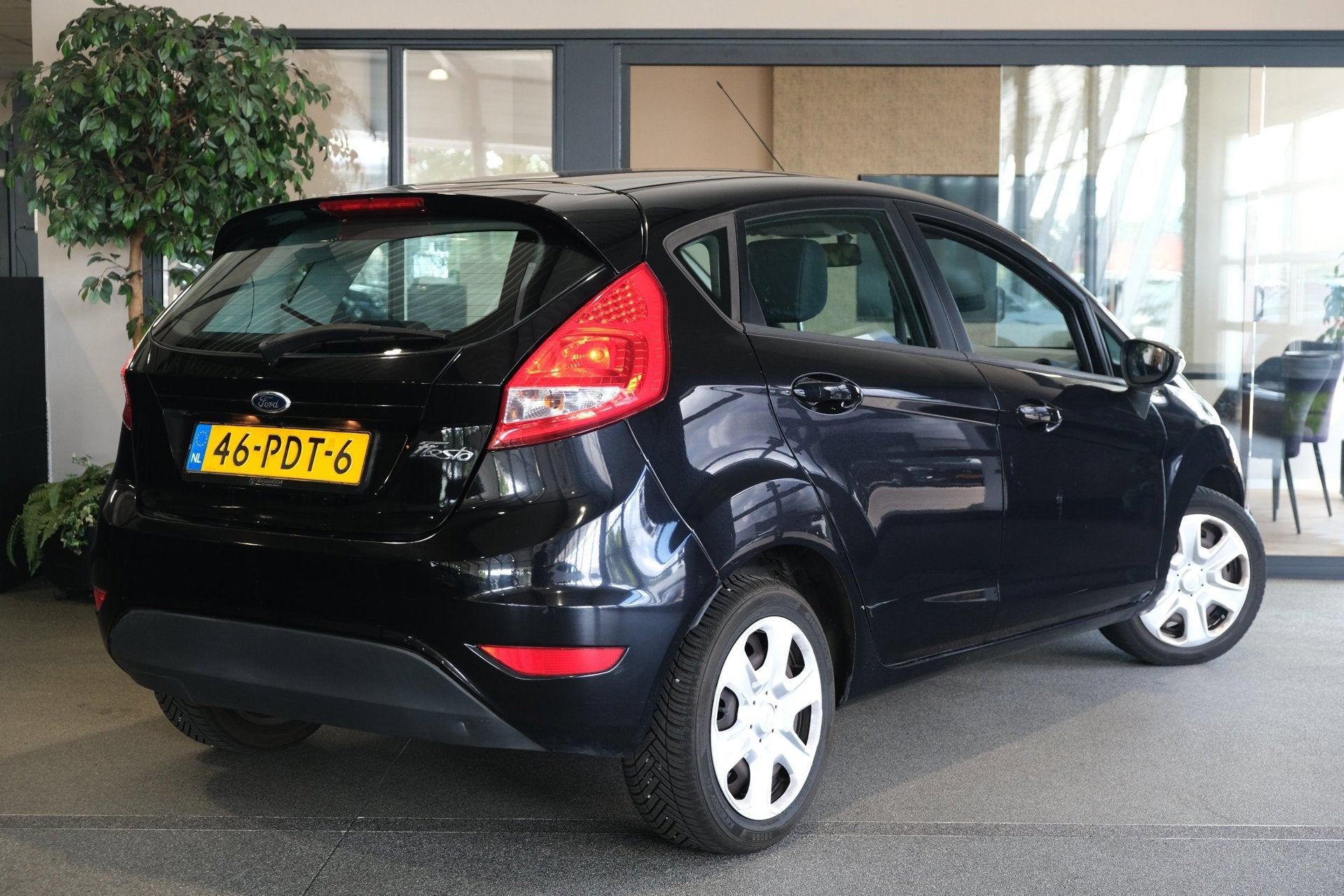 Ford Fiesta 1.25 Limited 60PK Airco, Auto's, Ford, Voorwielaandrijving, Euro 5, Stof, 4 cilinders