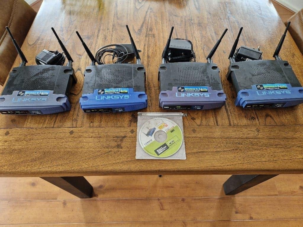 4 Linksys Wireless-G 2,4 GHz Broadband Routers., Ophalen, Gebruikt, Router, Linksys