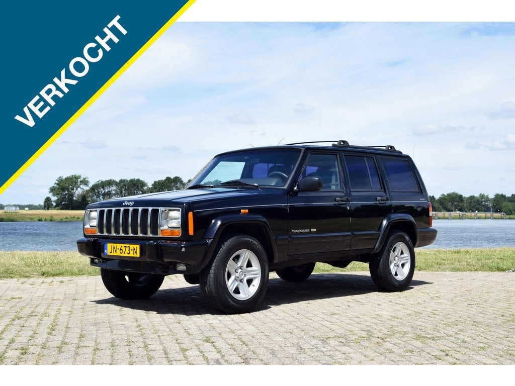 Jeep Cherokee 4.0i Limited (bj 2000, automaat), Auto's, Oldtimers, Cabriolet, Zwart, Leder, Geïmporteerd