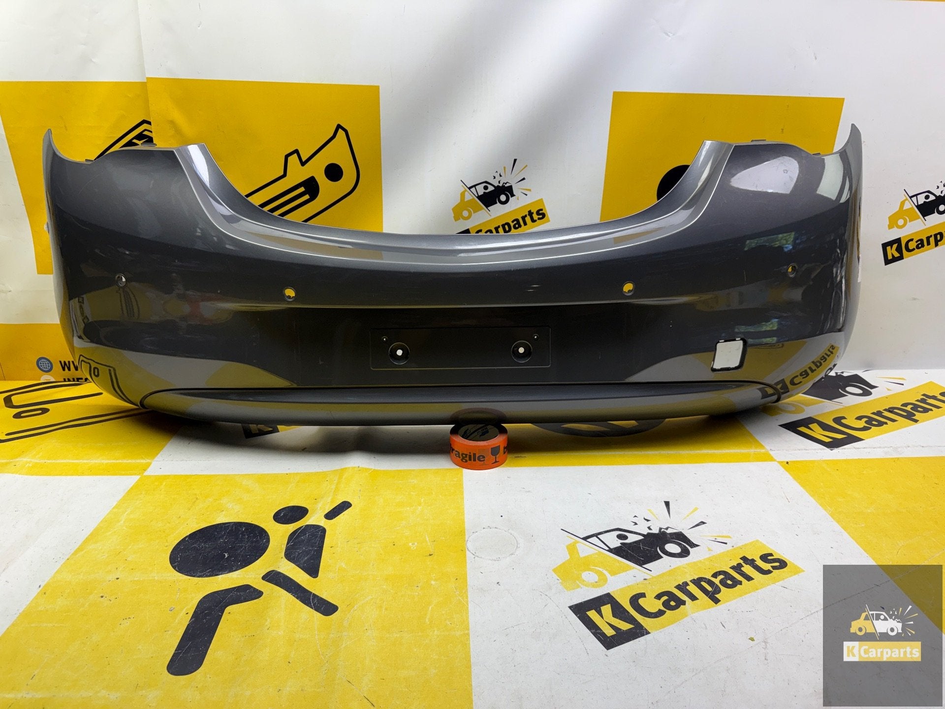 OPEL CORSA E Achterbumper 2014-2019 39002839 bumper 4xPDC, Gebruikt, Opel Automobile GmbH, Ophalen of Verzenden, Kontakt@opel-infoservice.de