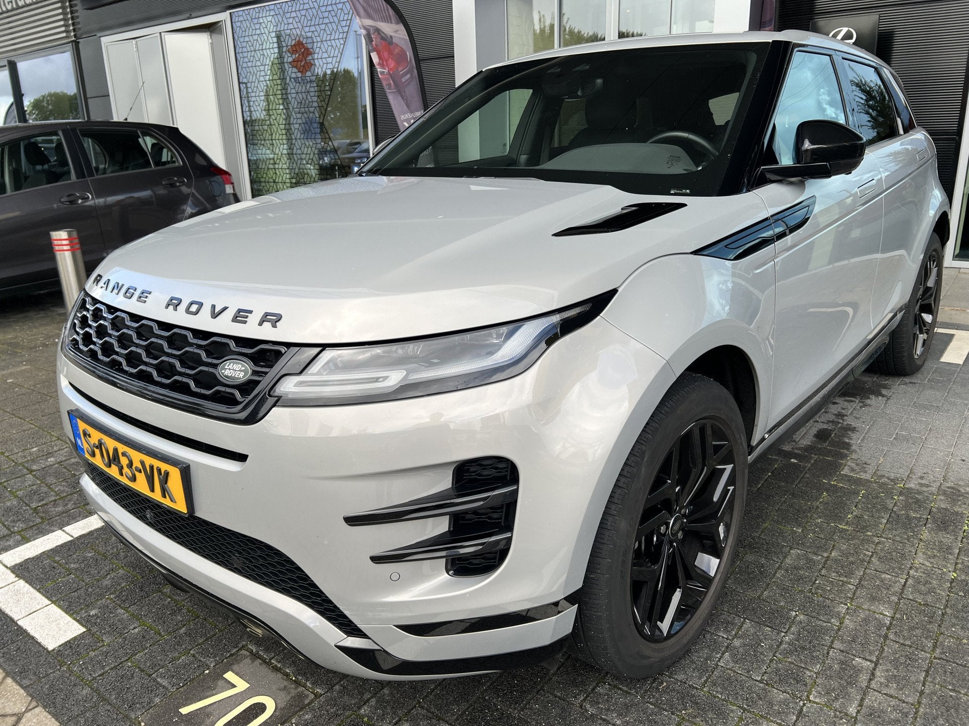 Land Rover Range Rover Evoque 1.5 P300e AWD R-Dynamic HSE |, Auto's, Dealer onderhouden, Bedrijf, Vierwielaandrijving, Hybride Elektrisch/Benzine