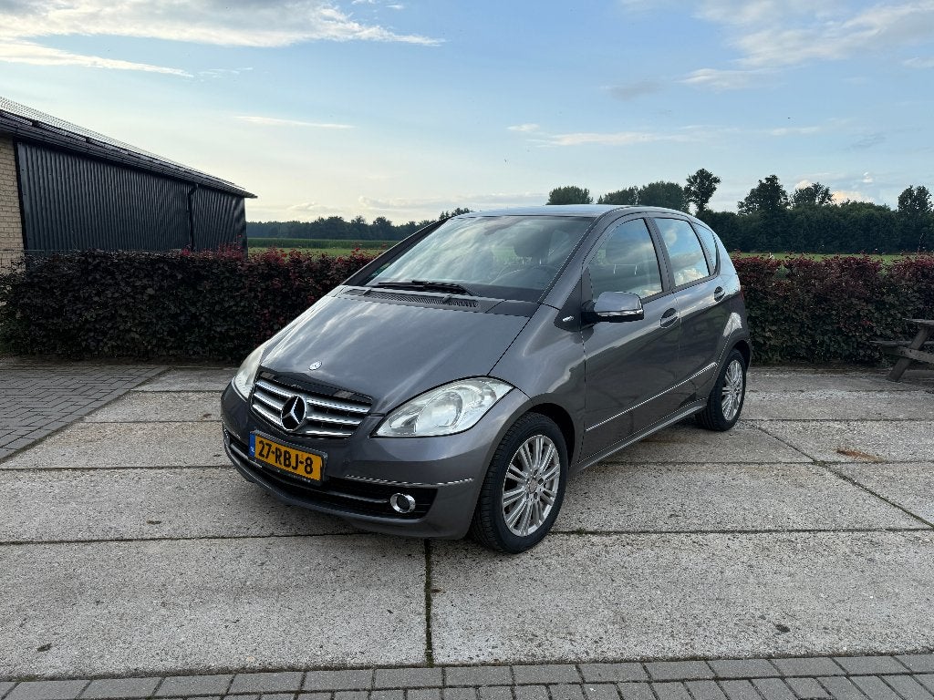 Mercedes-Benz A-Klasse A180 Elegance 5DRS AUT 2009 (W169), Zwart, 4 cilinders, Leder en Stof, 14 km/l