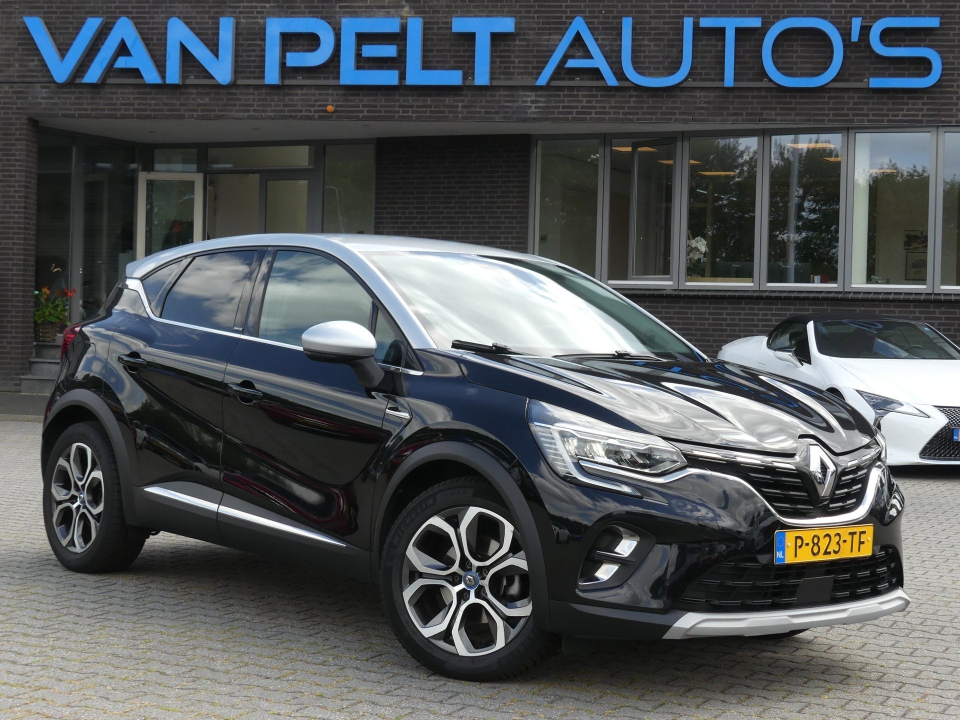 Renault Captur 1.6 E-Tech Plug-in Hybrid 160PK Intens, Auto's, 77 km/l, Gebruikt, 4 cilinders, Leder en Stof