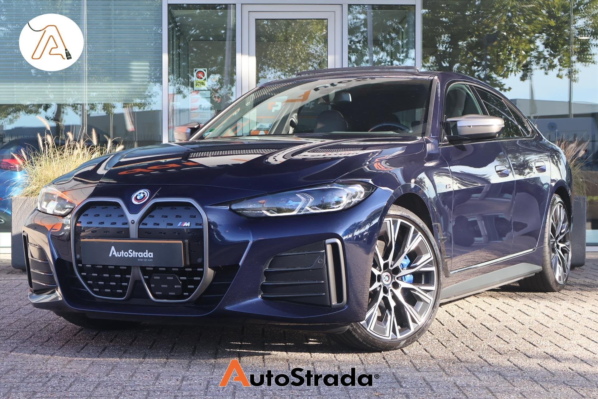 BMW I4 (g26) M50 544pk M-Sport SoH 94% | Tansanietblau | Pan, Auto's, Dealer onderhouden, Gebruikt, Huisgarantie, Blauw