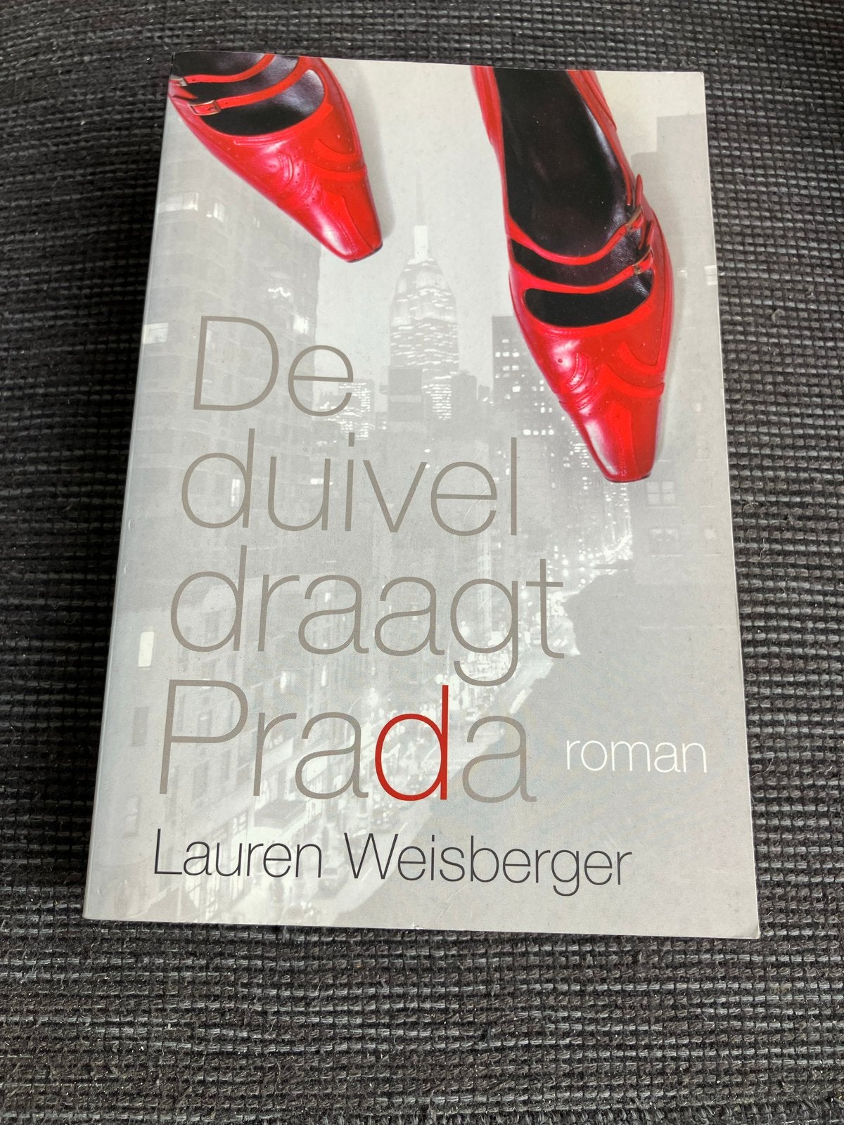 De duivel draagt Prada - Lauren Weisberger, Ophalen of Verzenden, Gelezen